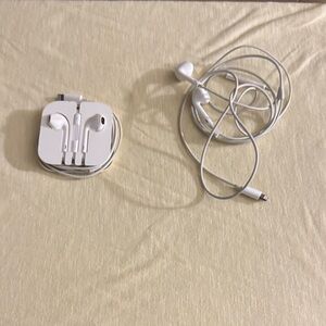Apple White EarPods with Lightning Connector. iPhone 14 are later